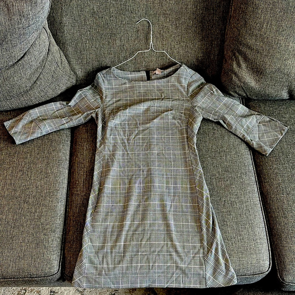 Size 10, Business form fitting pencil dress. Knee length. Quarter length sleeve.